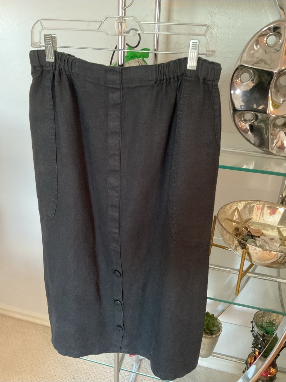 Black Elastic Waist Button-Front Midi Skirt with side pockets.